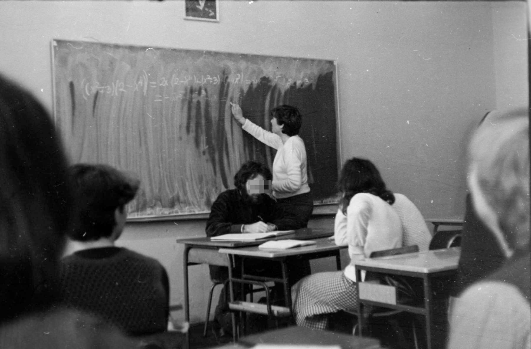 No tap in the classroom, so the orderly had to go to the toilet to wash the sponge, which never happened often enough.